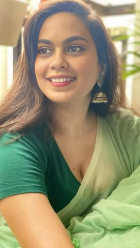 Green Saree Sitting